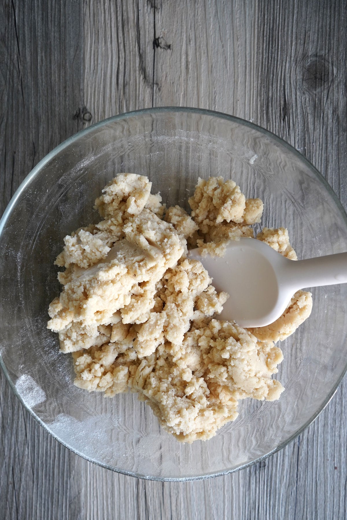 Eggless sugar cookie dough in a bowl that has just come together. 