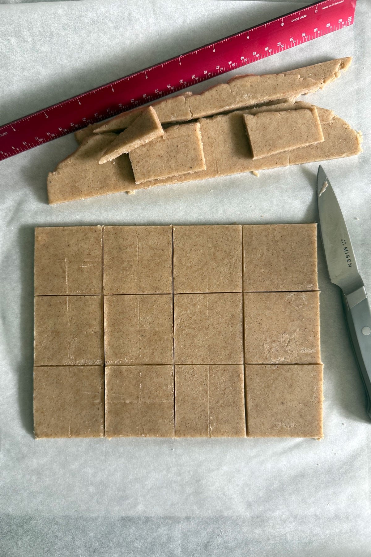 Eggless sugar cookie dough cut in squares.