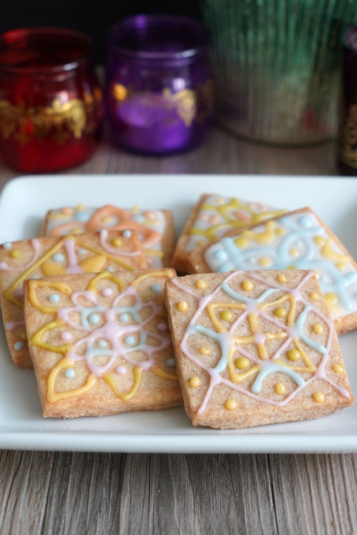 Rangoli cookies on a plate designed without a white background.