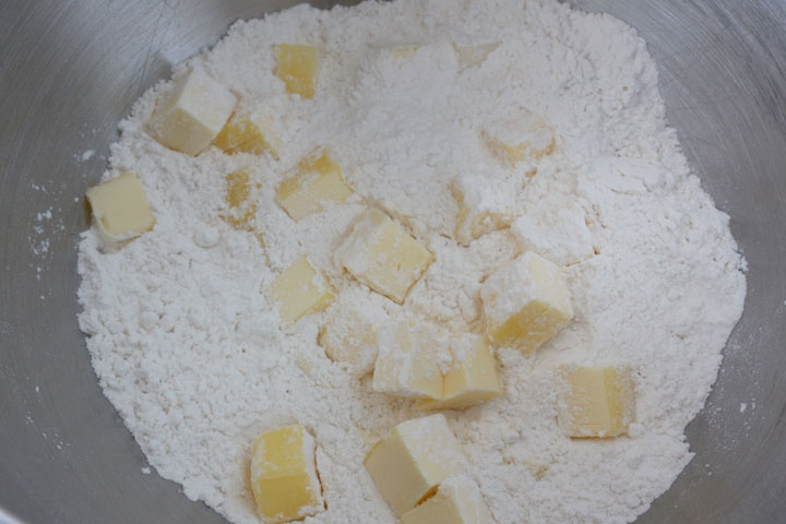 Cubes of cold butter in flour.