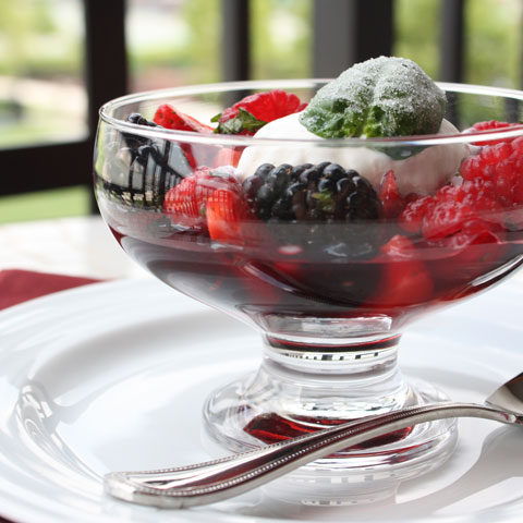 This refreshing summer berry salad cocktail is a quickly made dessert and can be dressed up for guests with an equally easy to do garnish. The berries are tossed with minced basil and mint and lemon Chambord “dressing”.