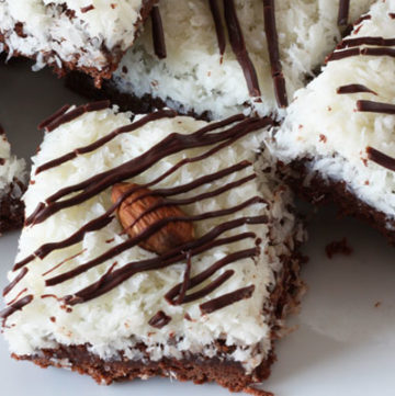 Almond Joy Brownies on white plate.