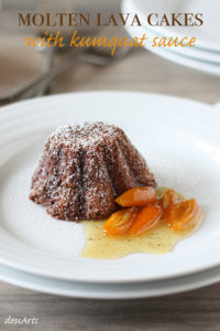 These flourless molten lava cakes are served up with a twist. A side of kumquat sauce makes a nice addition to to gooey melty warm chocolate cake.