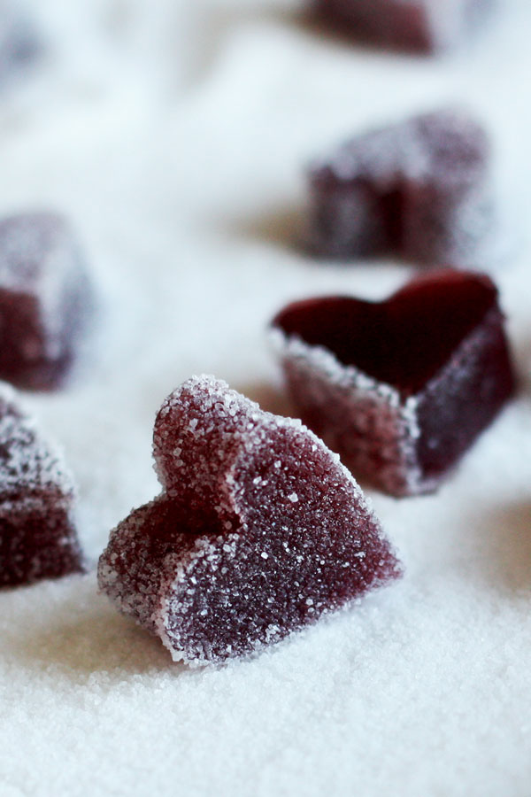 Close up view of heart shaped wine jellies.