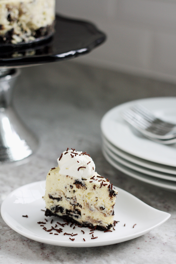 A slice of Instant Pot oreo cheesecake on a white plate