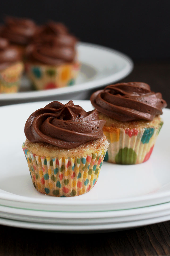 Churro Cupcakes are full of cinnamon flavor and topped with a delicious chocolate cream cheese frosting.