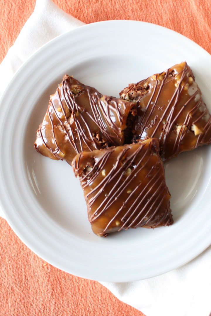 Two dozen sticky, gooey, chocolaty, caramel brownies individually packed and ready to go! Get the recipe to enjoy for yourself or your next bake sale.