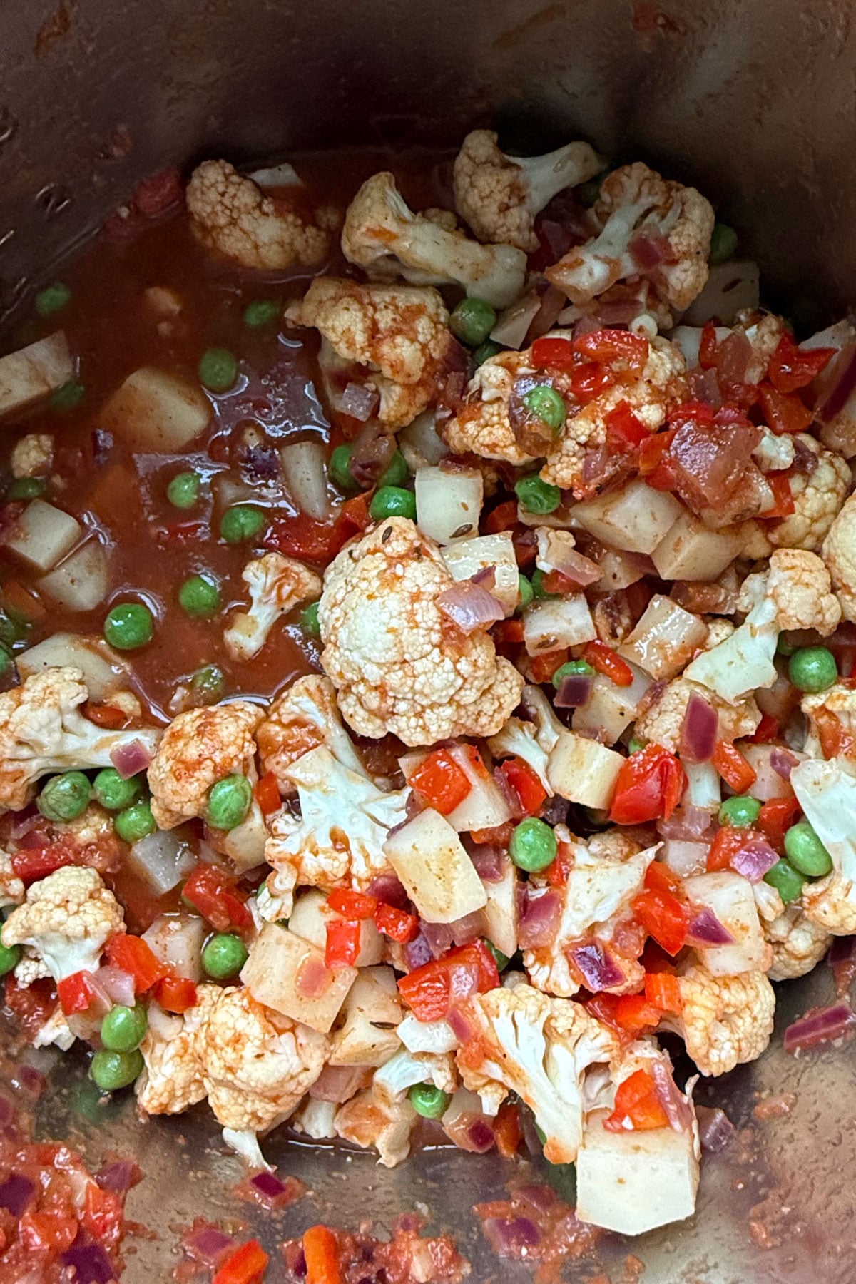 Vegetables and water added to Instant Pot for pav bhaji.