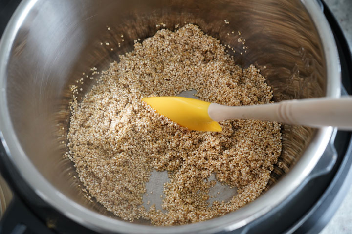 Quinoa being sauteed in Instant Pot.