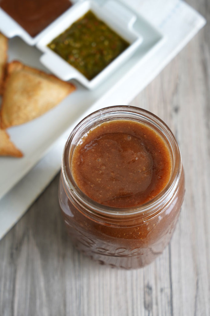 Tamarind date chutney in a mason jar.