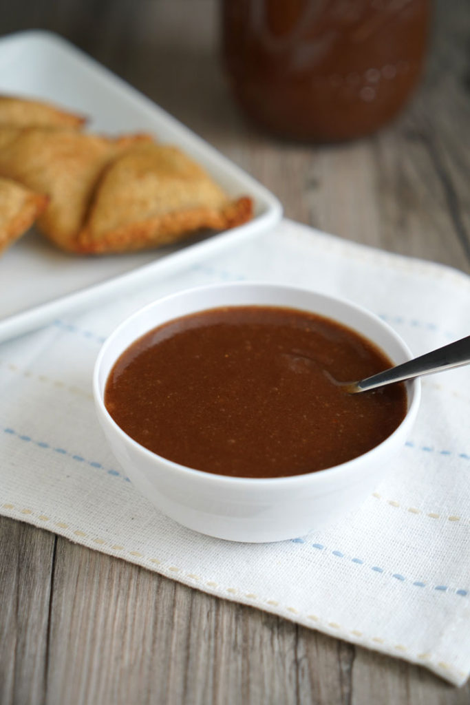 Bowl full of tamarind date chutney.