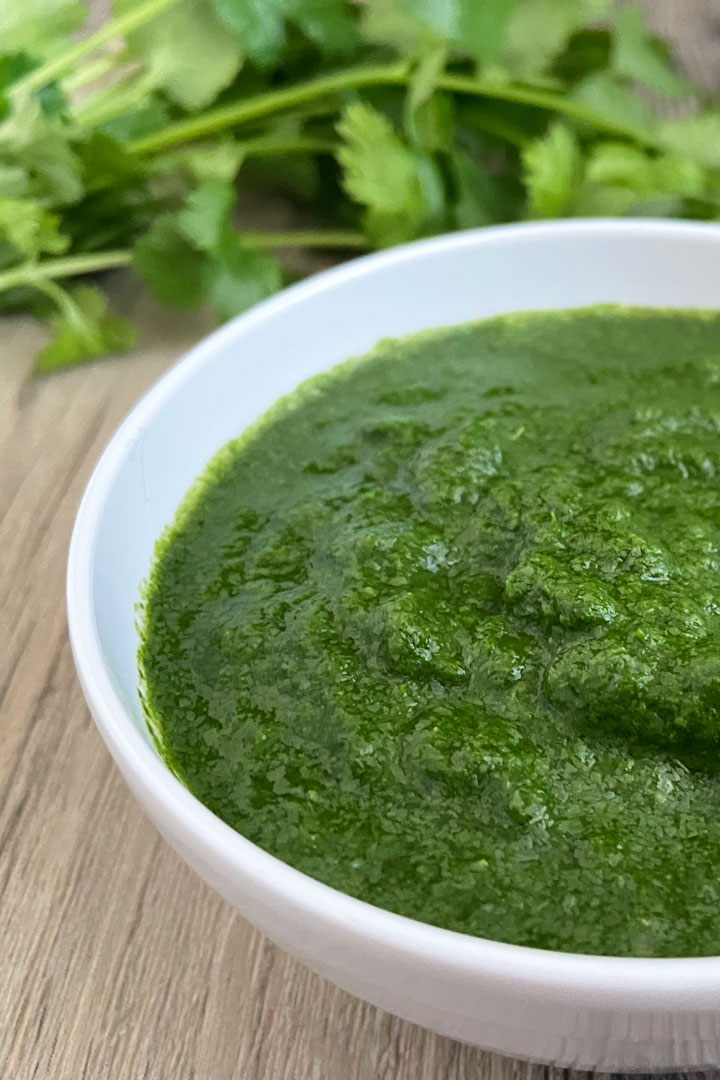 Close up view of cilantro mint chutney.