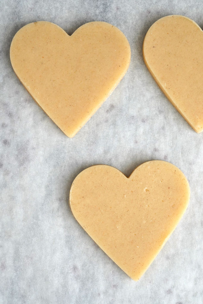 Heart shaped sugar cookie dough cut out.