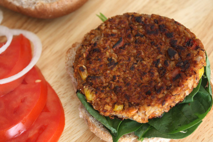 Open spicy black bean burger showing the patty.