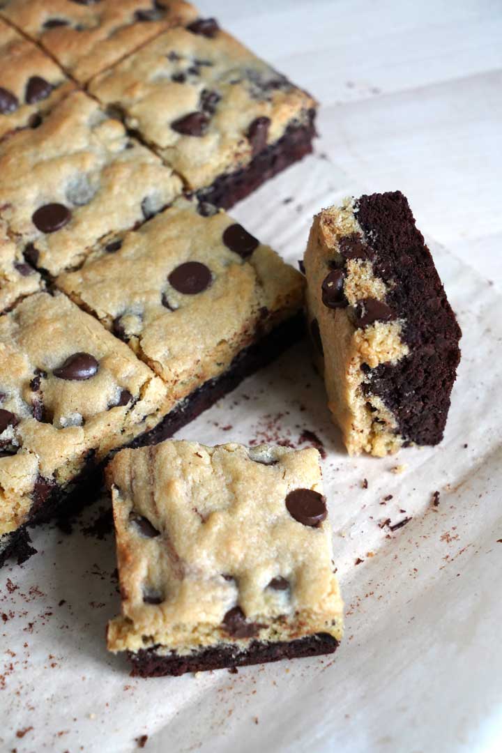 Cut brookie squares on parchment.