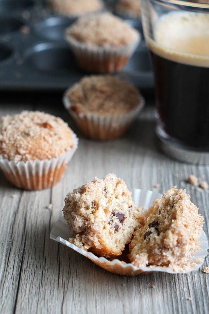 Split open mini coffee cake showing chocolate chips inside.