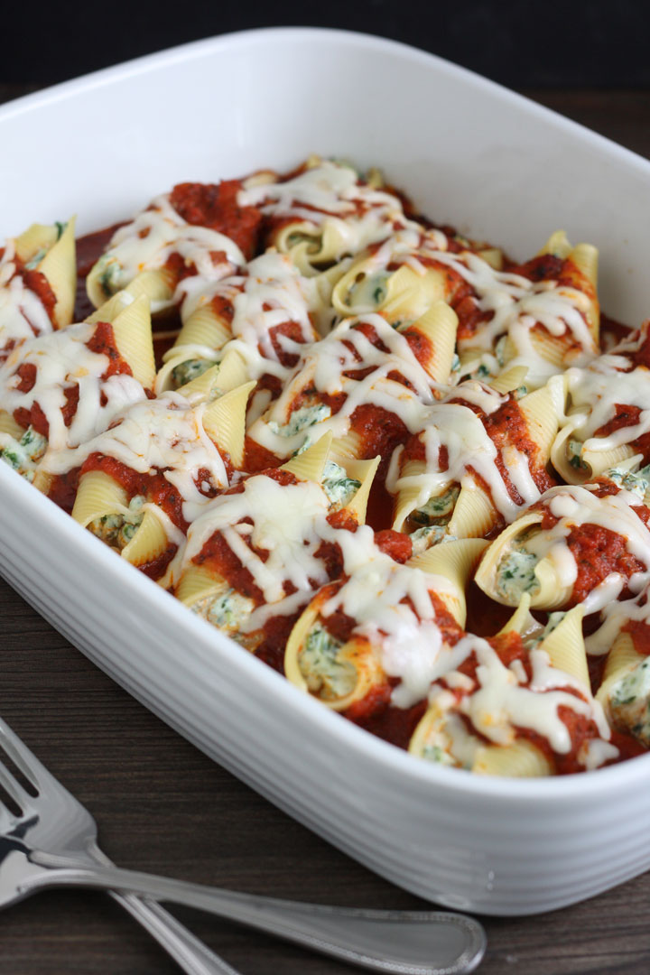 Stuffed shells in casserole dish.