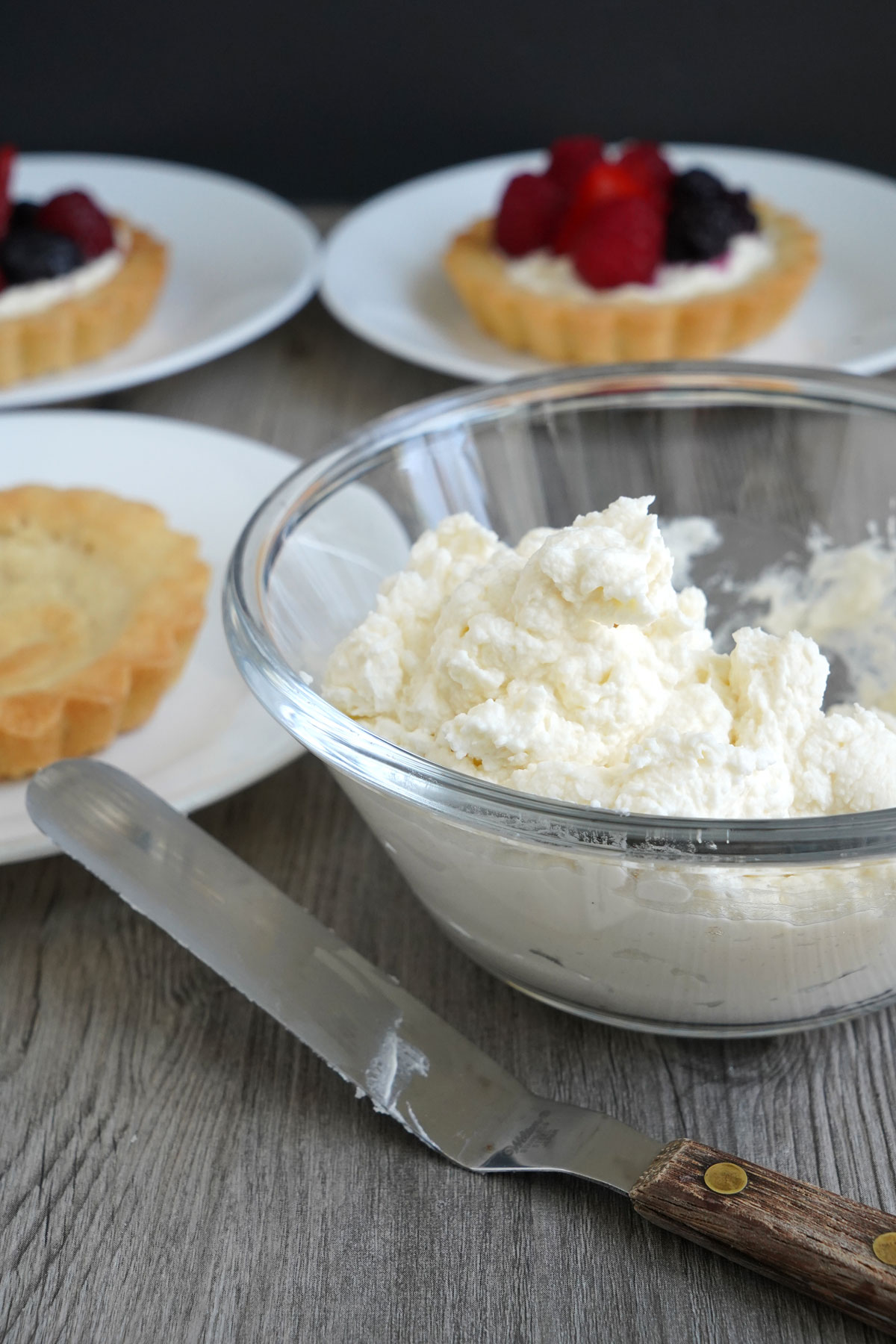 A bowl full of mascarpone filling for tarts.