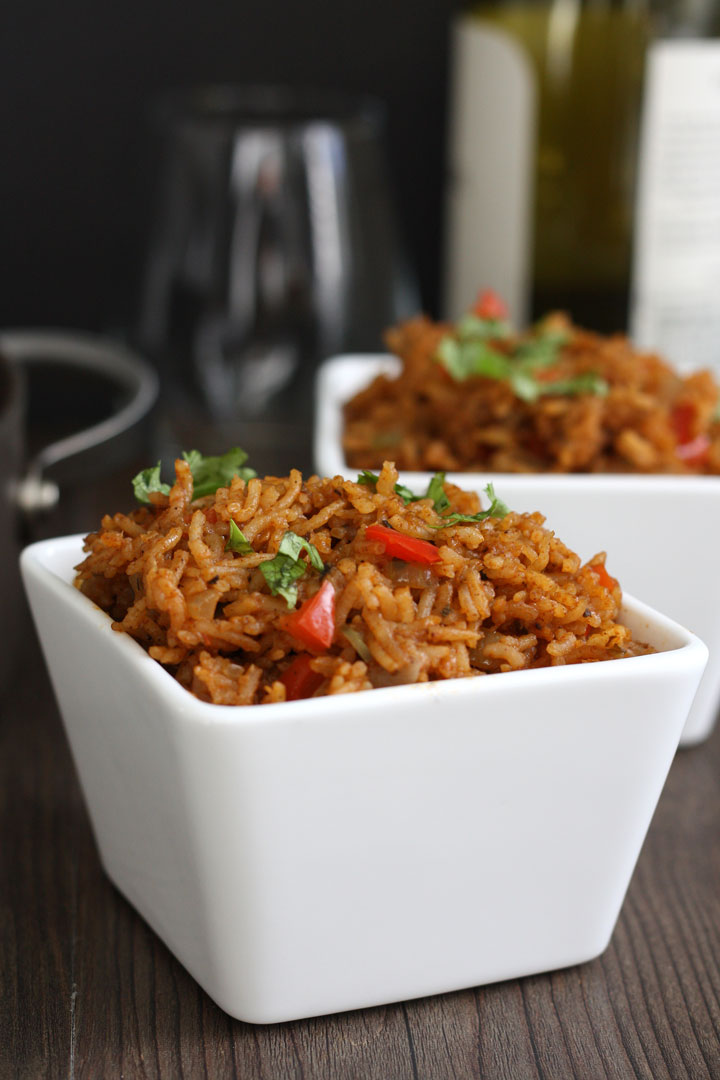 Mexican rice in white bowl.