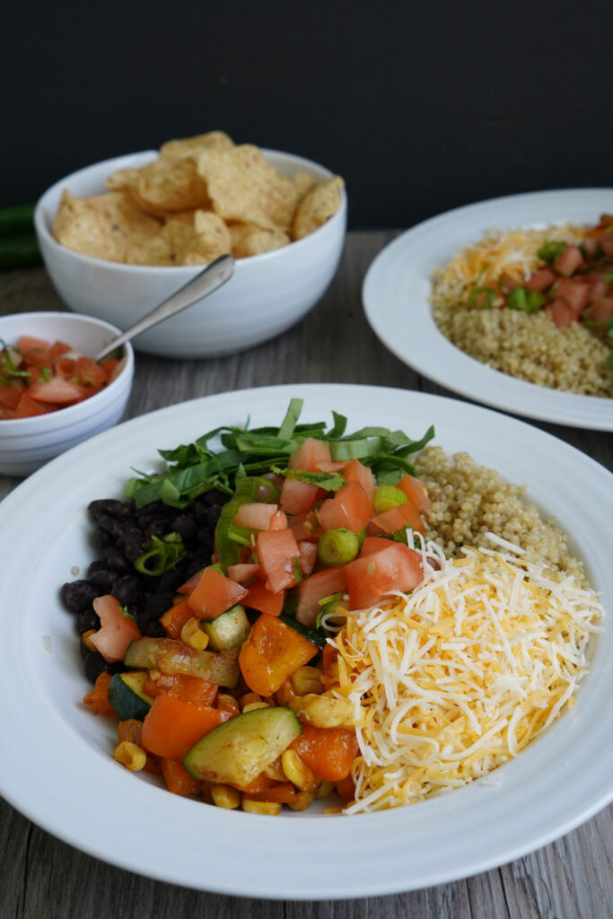 Quinoa burrito bowl before mixing all the ingredients.