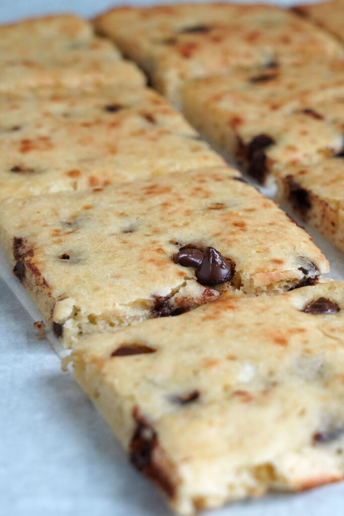 Sheet Pan Pancakes closeup on parchment paper.