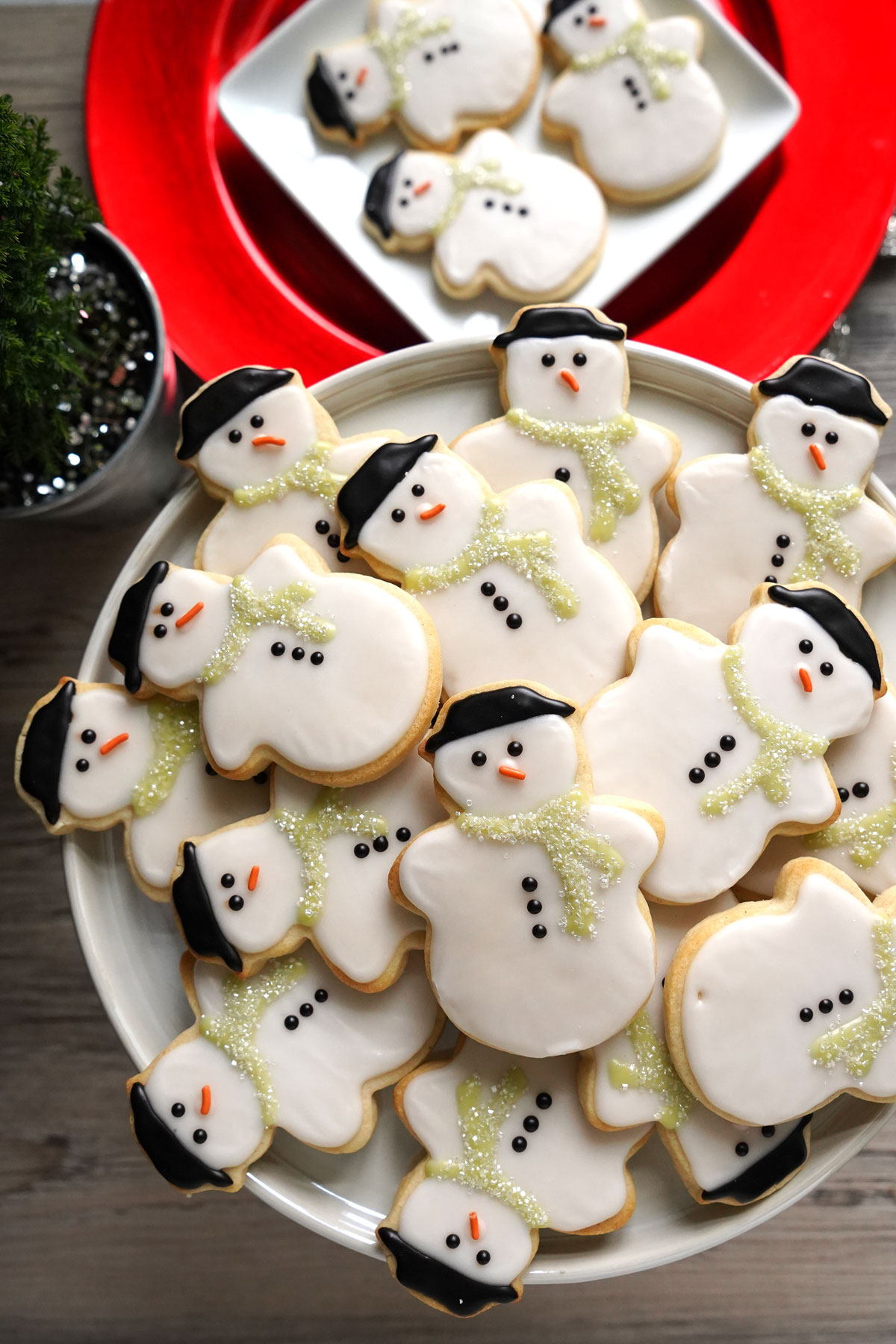 Tray of decorated snowman sugar cookies.