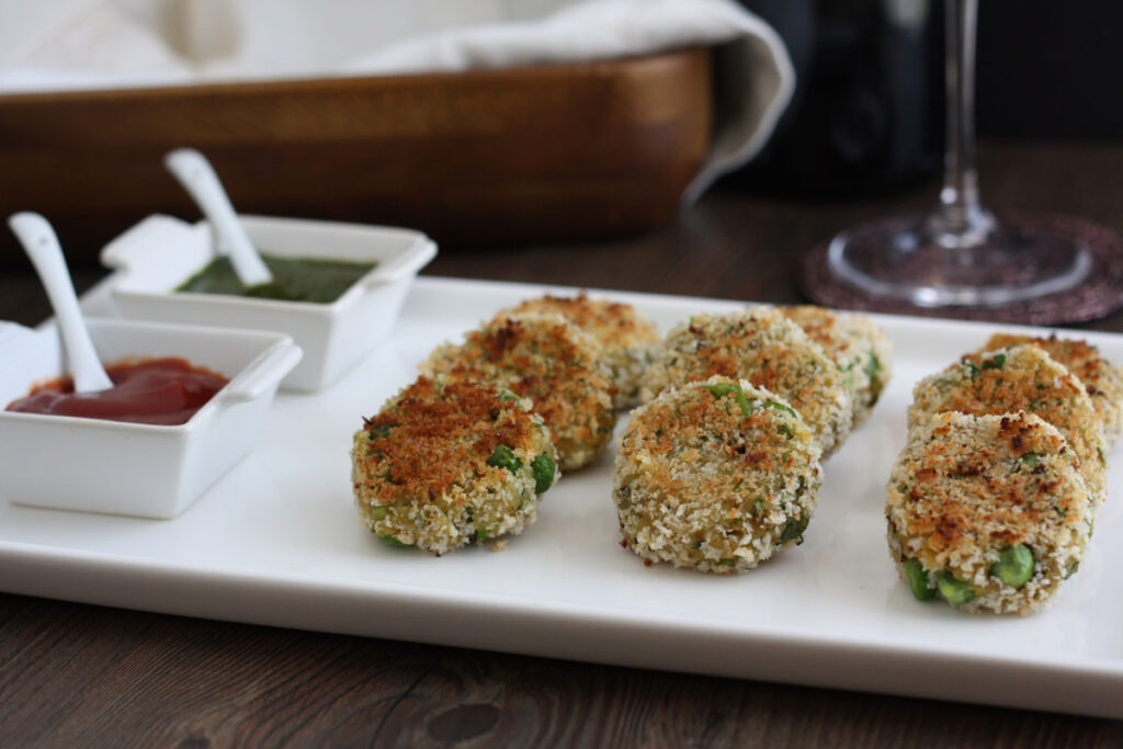 Aloo tikki in a white plate served with chutney.