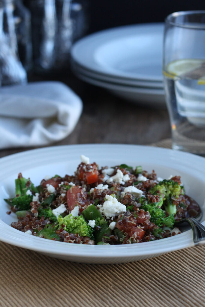 Lemon quinoa salad in a white plate.