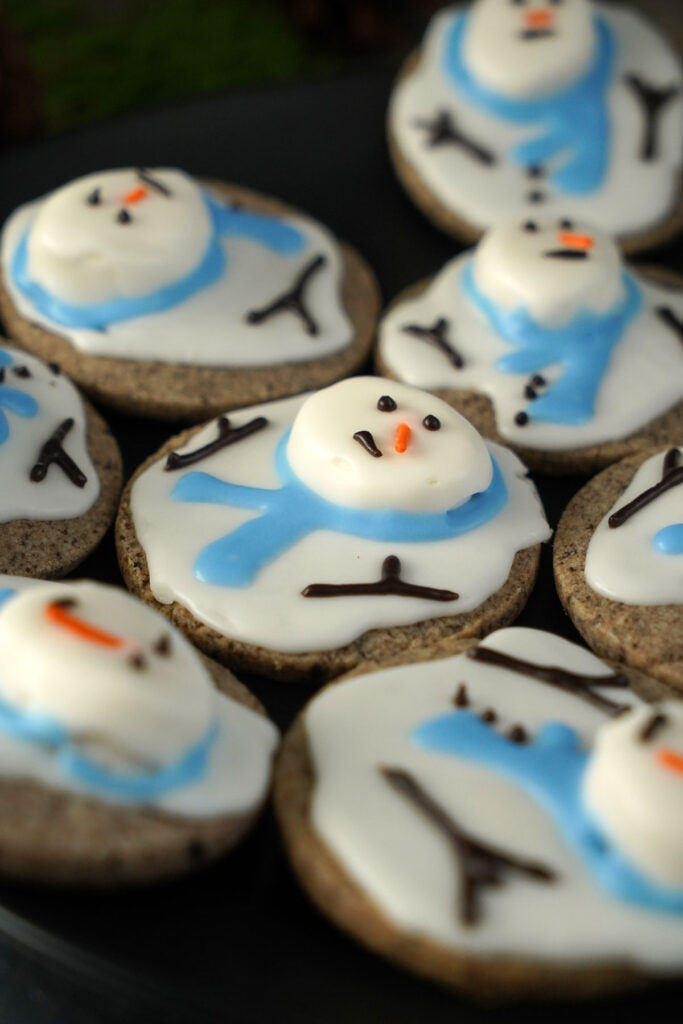 Close up of melted snowman cookie.