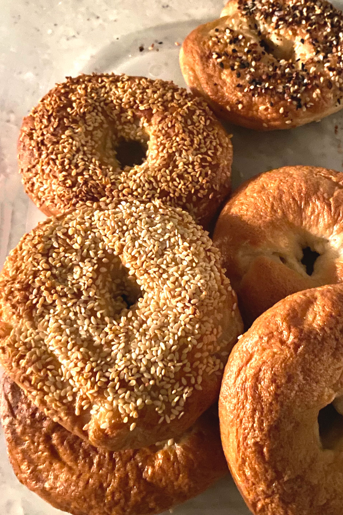 Variety of bagels top view.