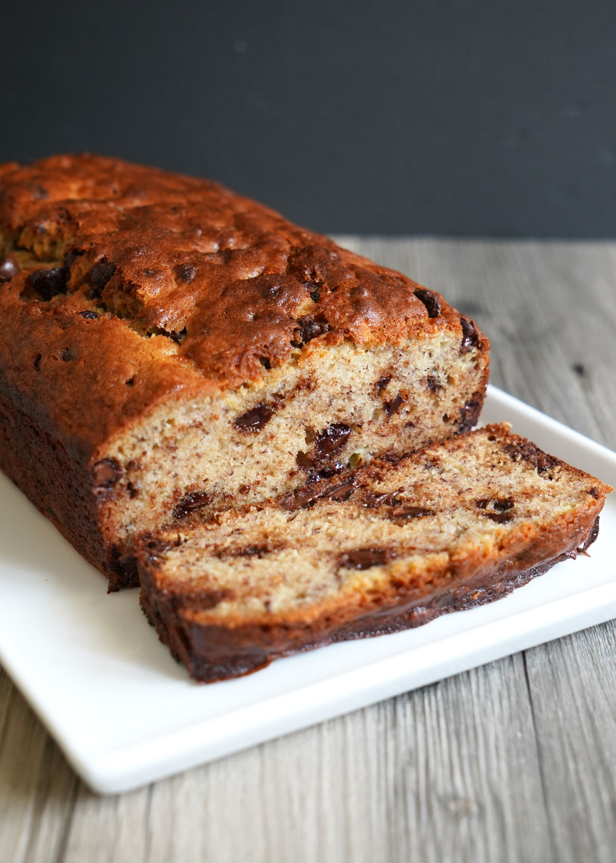 Sideways view of banana bread loaf sliced.