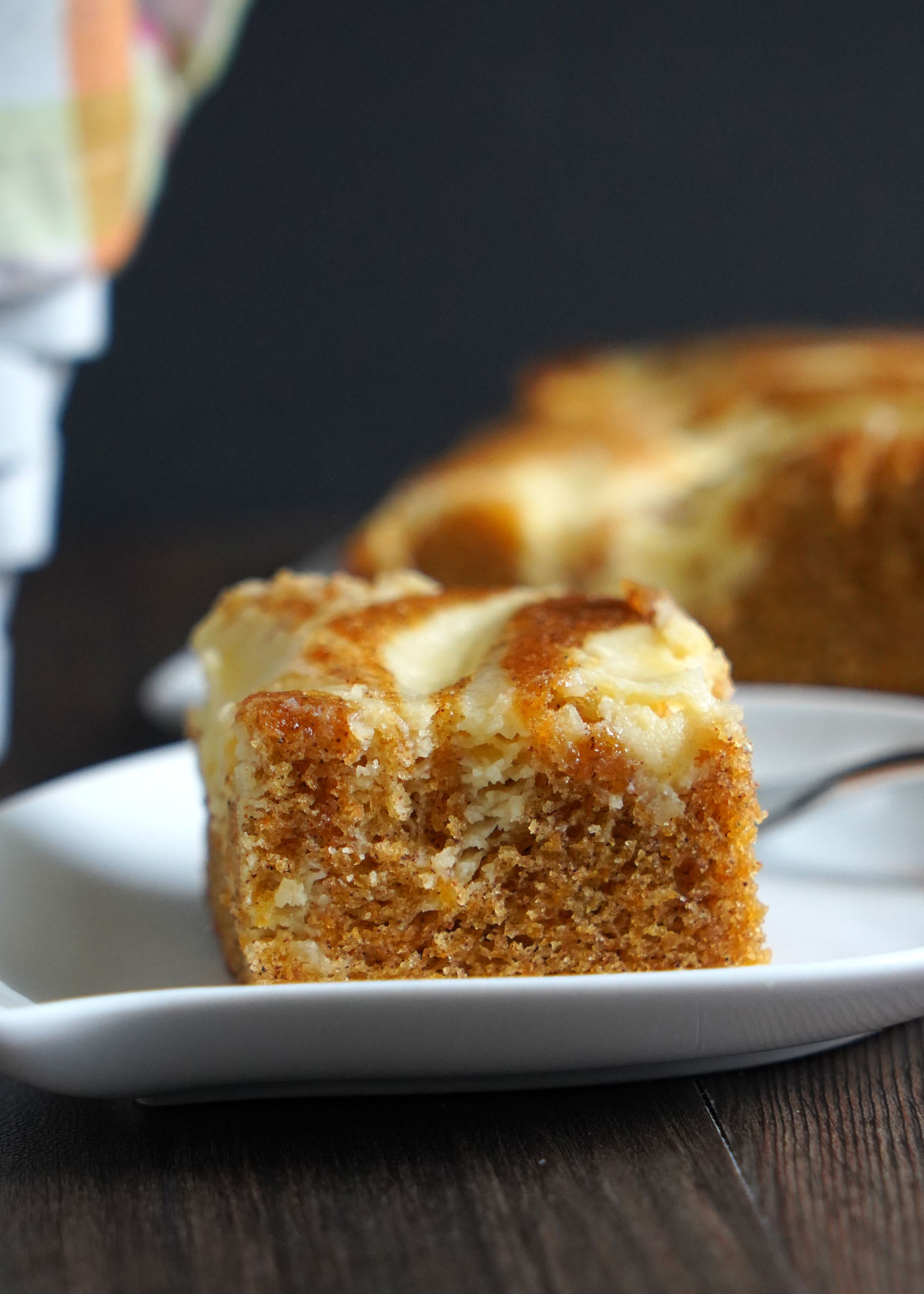 Close up view of carrot cake cheesecake crumb.