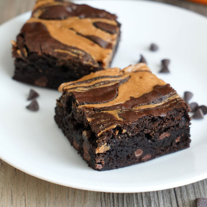 Two peanut butter brownie in a white plate.