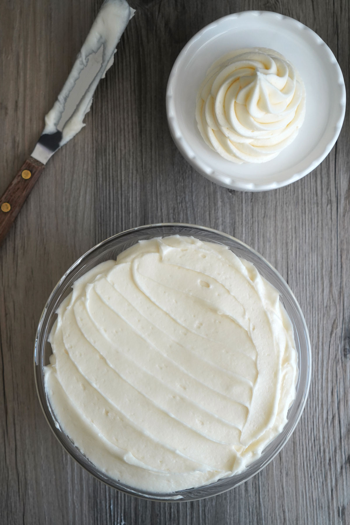 Top view of cream cheese frosting in a bowl.