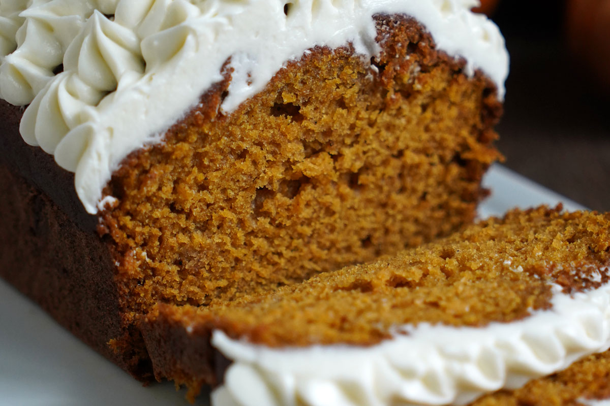 Close up view of sliced pumpkin bread.