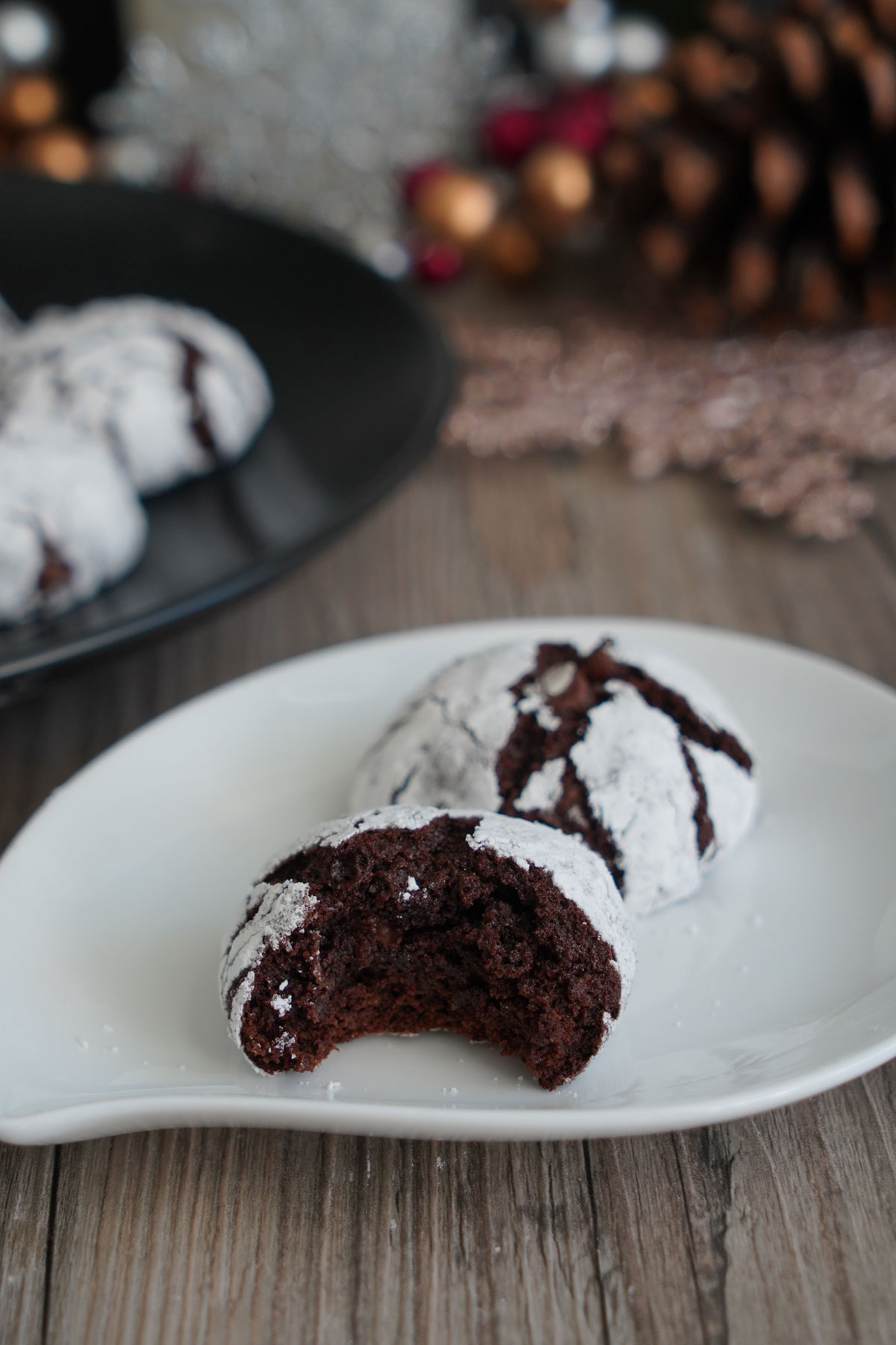 Close up of inside of soft fudgy chocolate crinkle cookie.