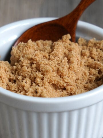 Soft brown sugar in bowl ready to be used in a recipe.
