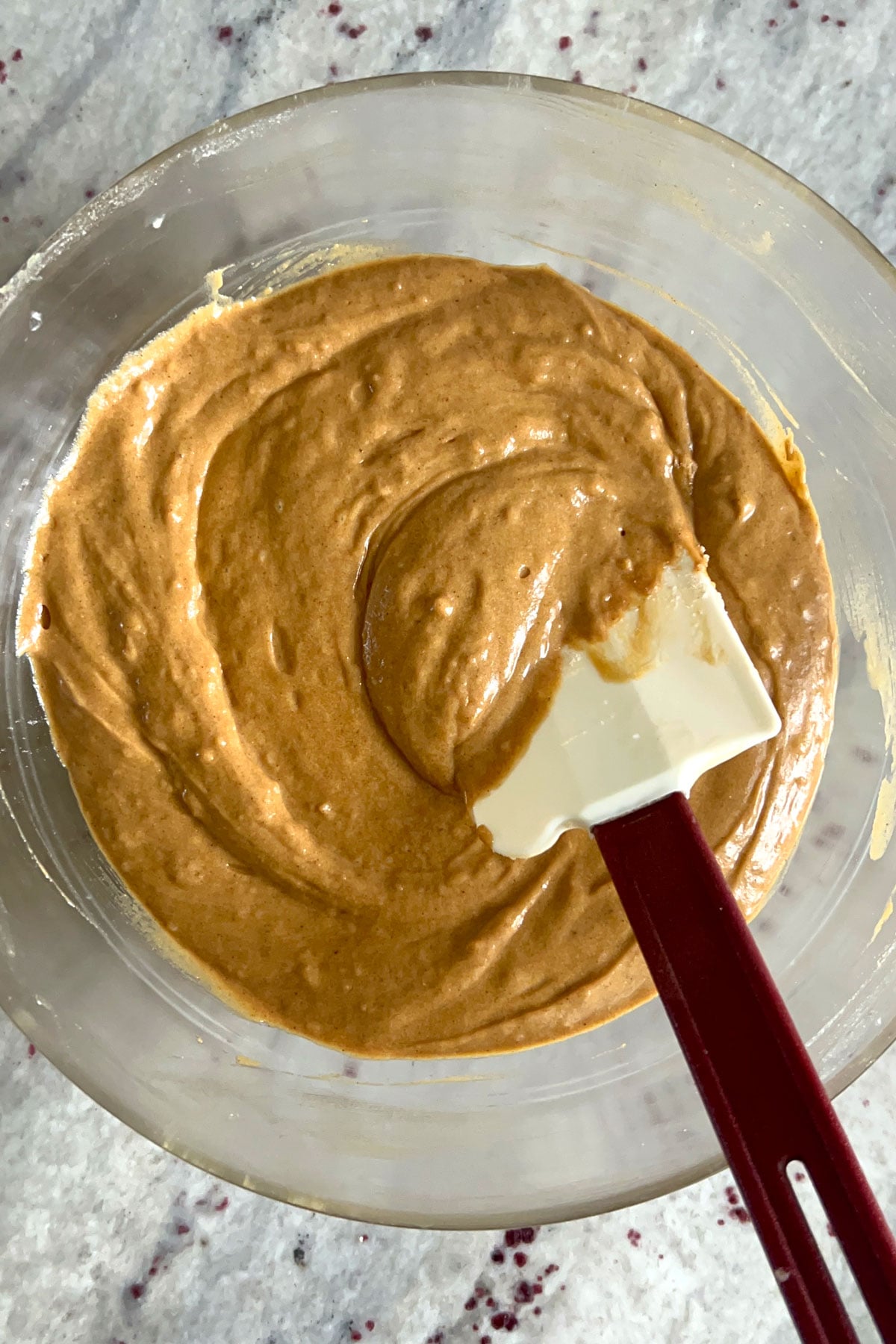 Gingerbread spice cake batter in a bowl.