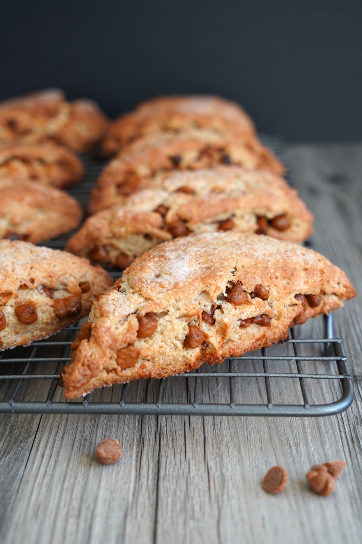 Cinnamon scones cooling on wire rack.