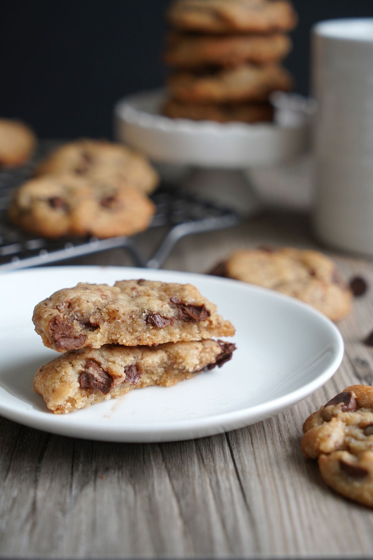 Cookie broken in half to show inside soft chewy texture. 