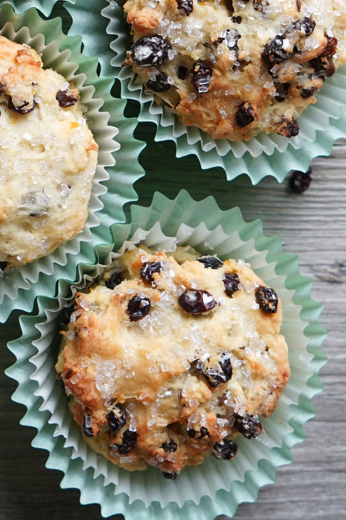 Top view of Irish soda bread muffins showing sparkling sugar on top. 