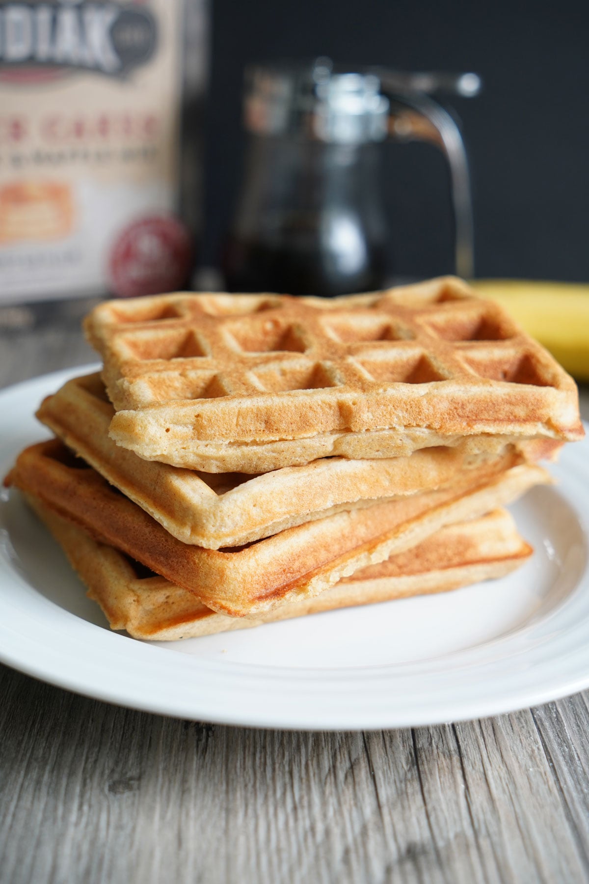 Stack of waffles on a plate. 