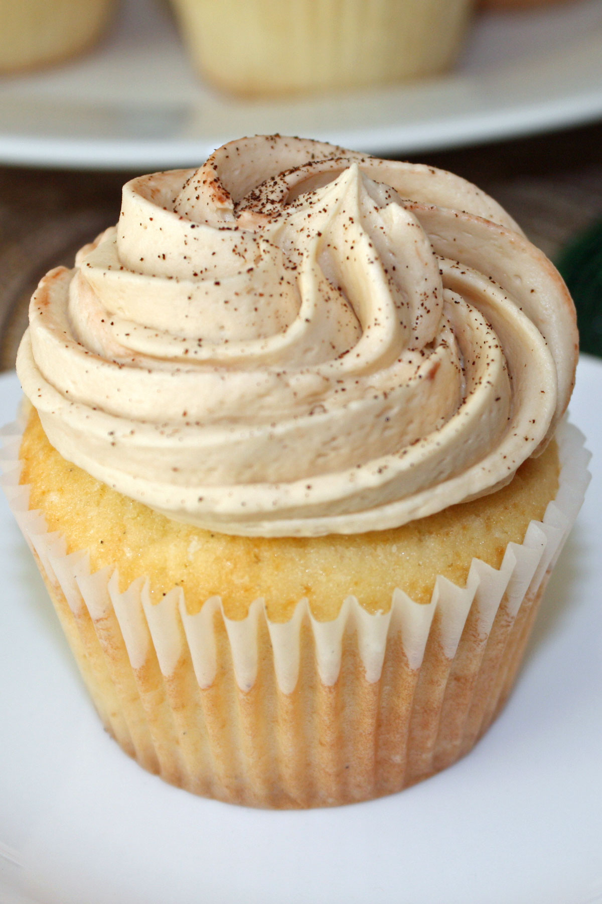 Vanilla latte cupcake showing off the frosting. 