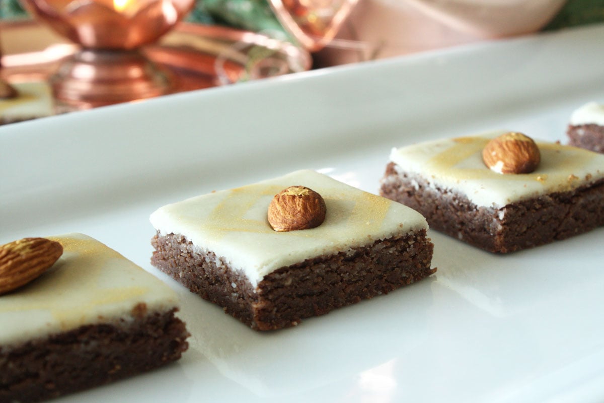 Chocolate Burfi lined up in a tray.